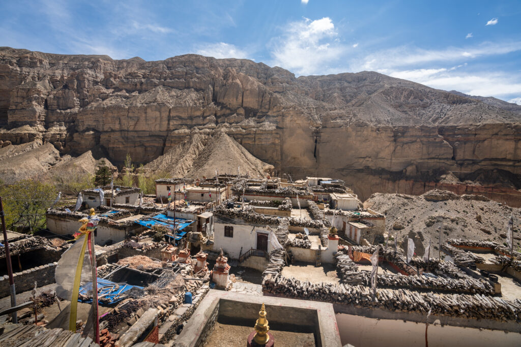 Packed adobe homes and stacked wood roofs are unique to the Upper Mustang region in Nepal.