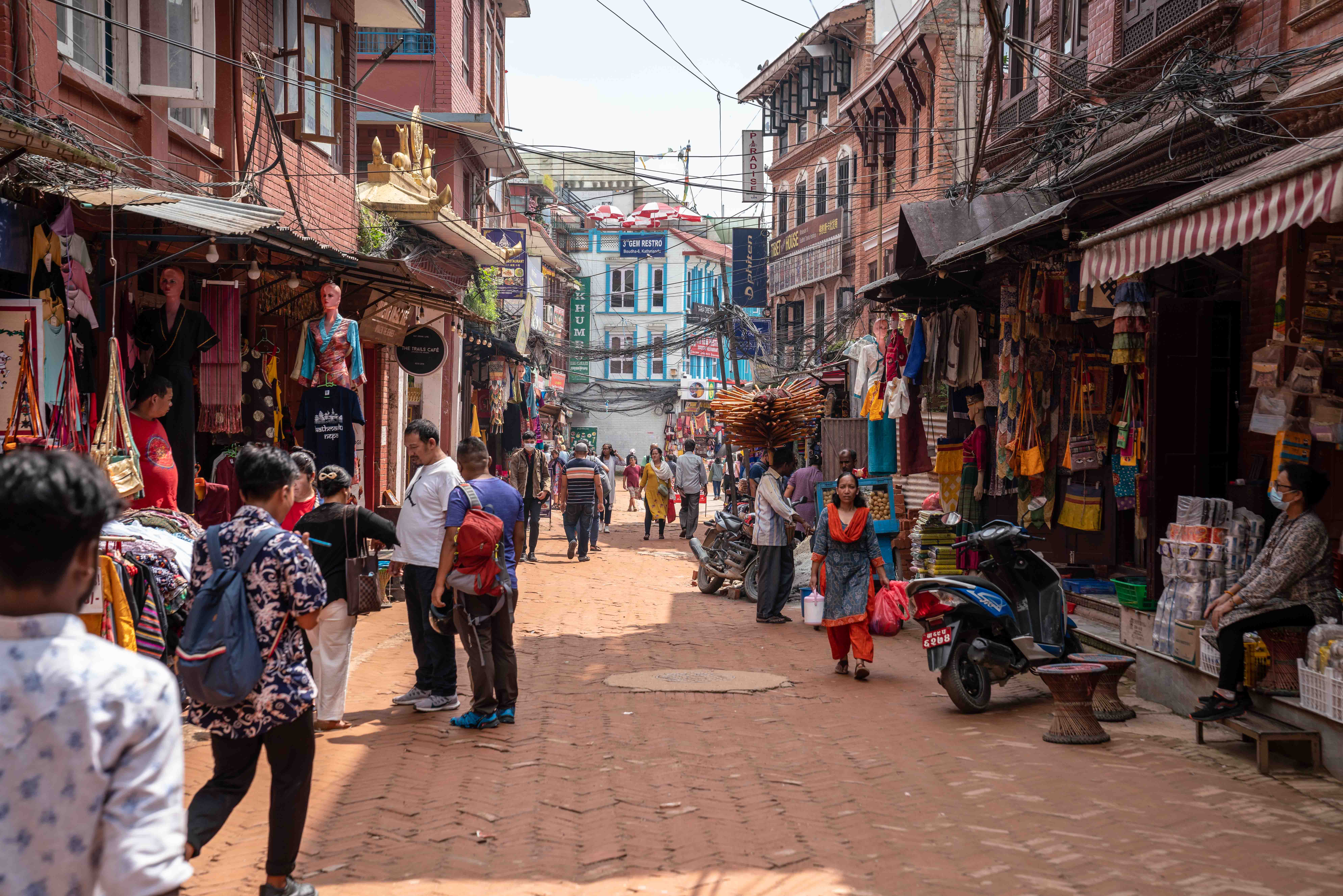 An old brick bustling street in Kathmandu, Nepal near the Boudanathstupa.